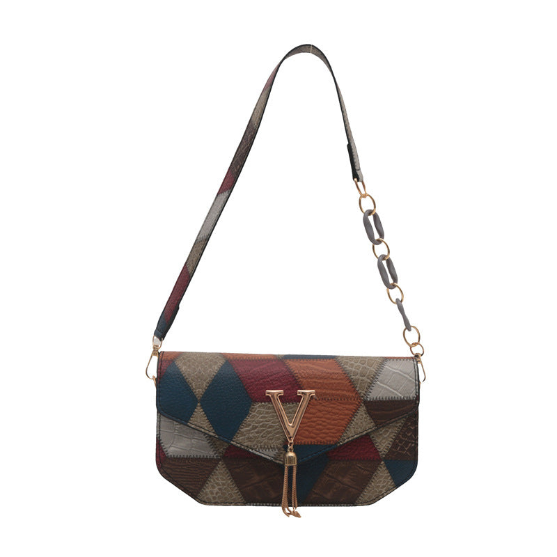 STATEMENT CLAMSHELL BAG